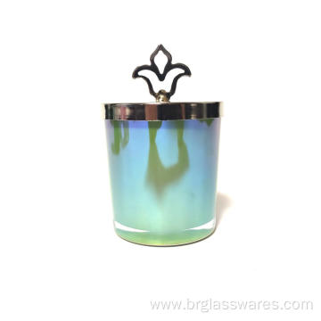 Colored glass candle jar with flame shape knob lid